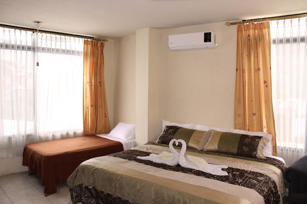 Planet House Hotel Puerto Ayora  Værelse billede
