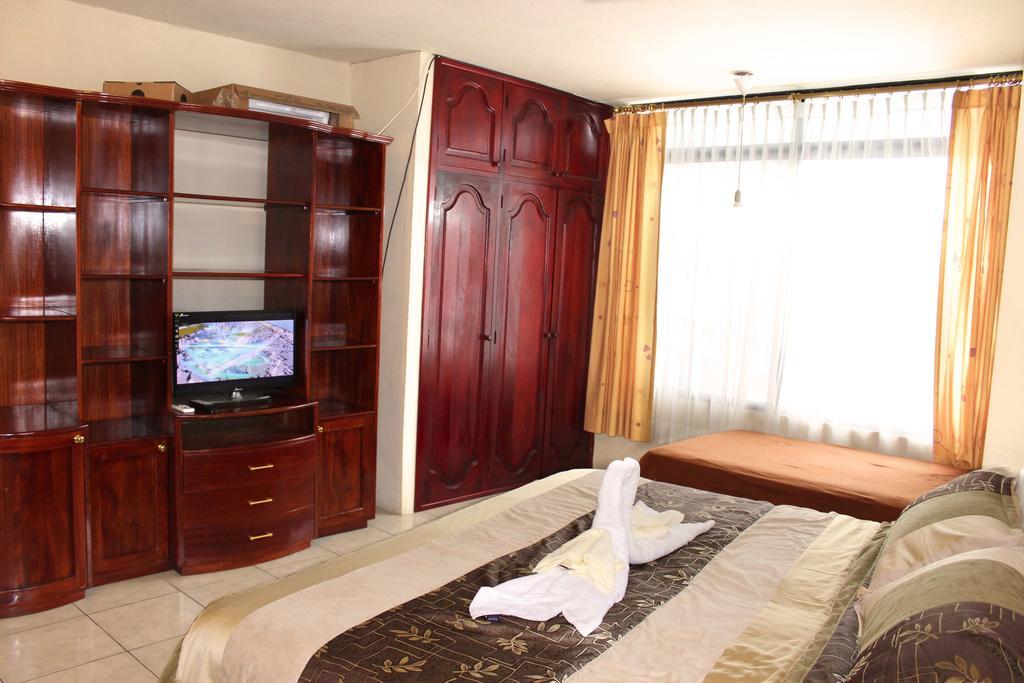 Planet House Hotel Puerto Ayora  Værelse billede